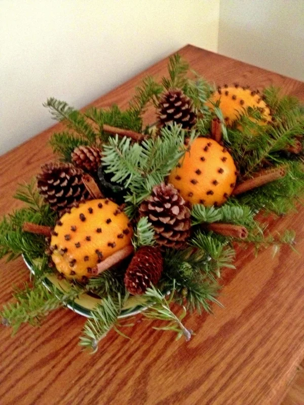 Weihnachtsschmuck basteln orangenschalen tannenzapfen zimt