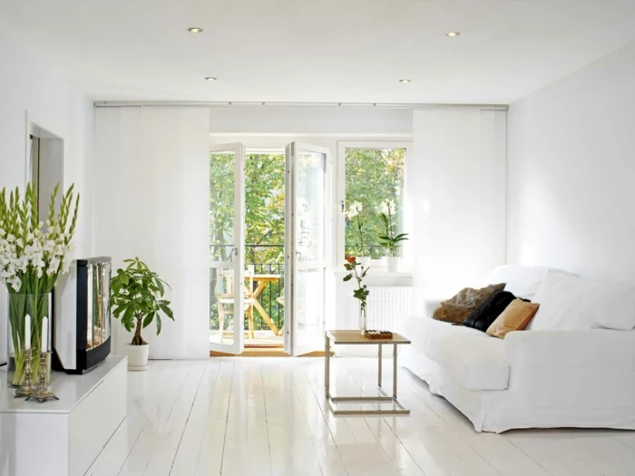 wohntrends weißes wohnzimmer pflanzen holzboden fernseher