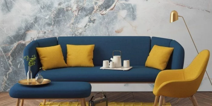 modernes sofa blautöne gelbe kissen sessel