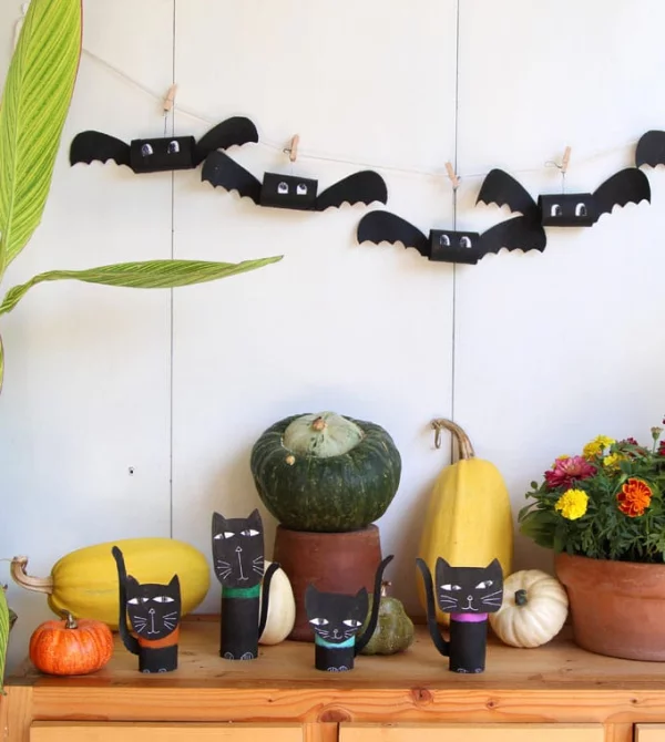 Fledermaus basteln mit Kindern zu Halloween – 50 bezaubernde Ideen und Anleitungen fledermäuse schwarz deko girlande