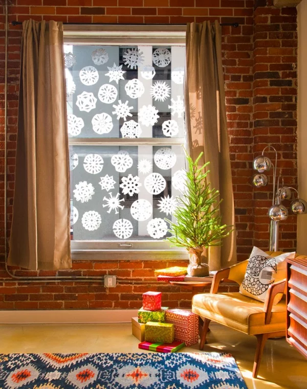 Fensterbilder basteln zu Weihnachten – zauberhafte Ideen und Anleitungen papierschnitte fensterdeko kaffeefilter